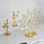Escultura Roda Gigante Dourada - vipzio