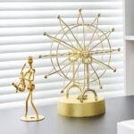Escultura Roda Gigante Dourada - vipzio