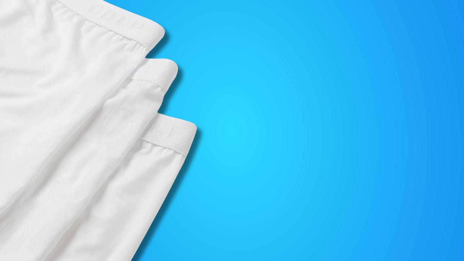 flat lay image of 3 white pairs of men's underwear
