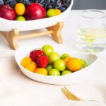 A Fruteira de Mesa Cesta de Frutas VipZio vai além de sua função prática – ela é uma peça elegante e multifuncional. Perfeita para embelezar mesas, organizar frutas frescas ou servir aperitivos com sofisticação. Com seu design em bambu, ela transforma qualquer envolvente, trazendo estabilidade entre utilidade e estilo.