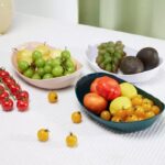 A Fruteira de Mesa Cesta de Frutas VipZio vai além de sua função prática – ela é uma peça elegante e multifuncional. Perfeita para embelezar mesas, organizar frutas frescas ou servir aperitivos com sofisticação. Com seu design em bambu, ela transforma qualquer envolvente, trazendo estabilidade entre utilidade e estilo.